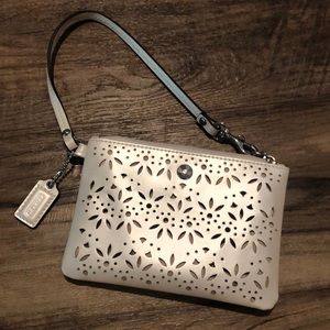 Coach wristlet pearl white laser cut